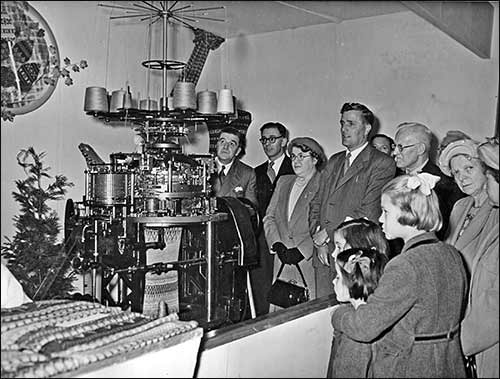 A commercial knitting machine demonstration