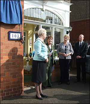 Barabra Jenney before she unveils the plaque