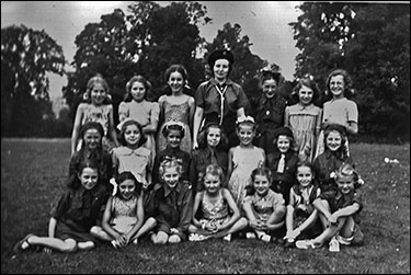 Phoograph showing Brownies with Brown Owl on a very hot day.