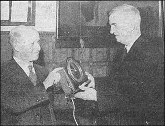 Thomas is presented with the clock