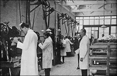 Photo of the welting, rounding and stitching department of the Boot and Shoe School, 1936-1937