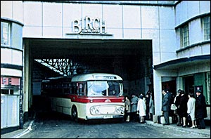 People queueing for the Birch's coach at their garage