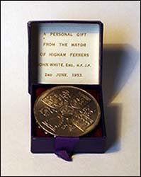 Coin in box presented 1953