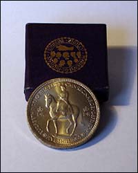 Photo of lid of coin box 1953